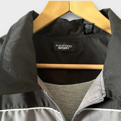 Chaqueta cortavientos Ashford Sport para hombre negra con cremallera completa negra y gris vintage Foto 1 de 4