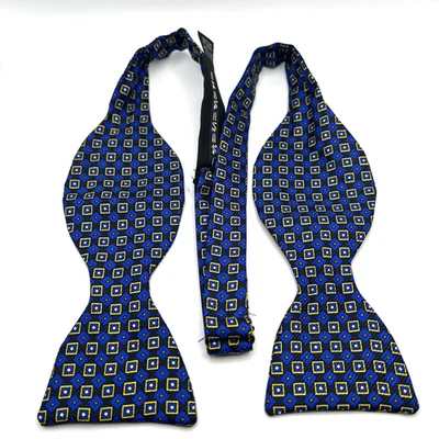 Vintage J. Pajarita Press para hombre azul marino/azul real dorado geo 100 % seda hecha en Reino Unido Foto 1 de 4