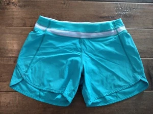 IVIVVA by LULULEMON Girls relay racer teal green blue athletic shorts - size 14 - Picture 1 of 8