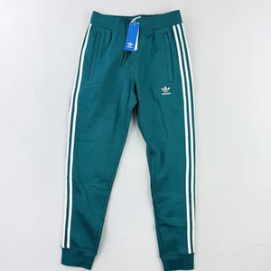 Pantaloni da jogging Adidas 3 strisce in pile Adicolor taglia S da uomo Legacy Teal JM6141 nuovi - Foto 1 di 12