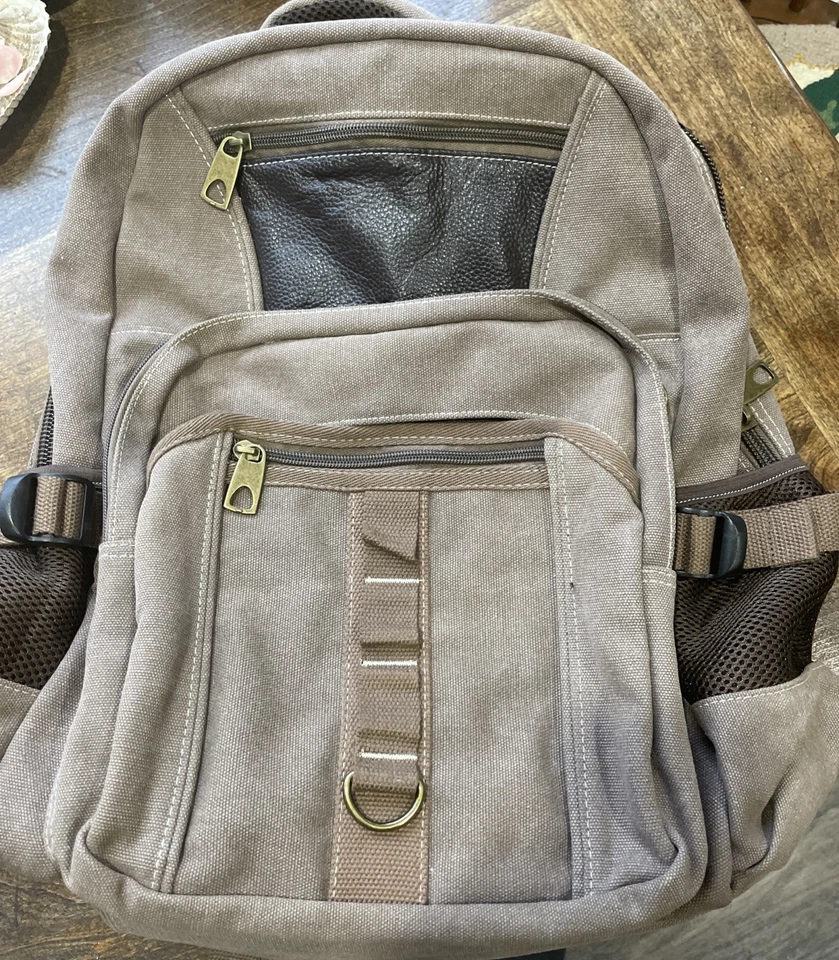 Canvas Backpack With Leather Trim Lots Of Pockets. Sturdy And Heavy Duty - Image 1 of 4