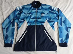 RARA GIACCA A VENTO GEOMETRICA ADIDAS ORIGINALS ISPIRATA AL CALCIO BLU MEDIO - Foto 1 di 4