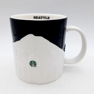 Taza Starbucks Seattle Collector Series Relief City Skyline negra blanca 2012 Foto 1 de 4