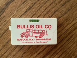 VINTAGE TAPE MEASURE W/LEVEL BULLIS OIL, ROSCOE NY - Picture 1 of 2