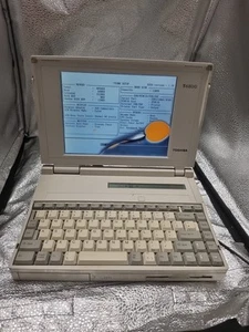 Ordinateur portable Toshiba T4500 rare vintage avec chargeur, pièce détachée ou à réparer - Photo 1/14