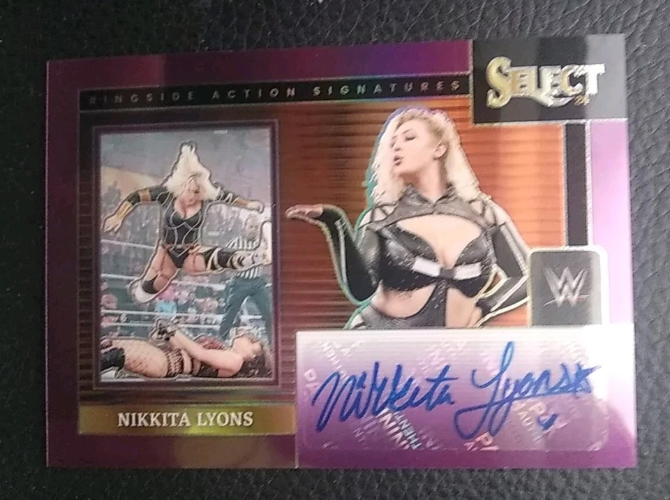 2024 WWE Select Nikkita Lyons Purple Ringside Action Auto /35 - Image 1 of 4