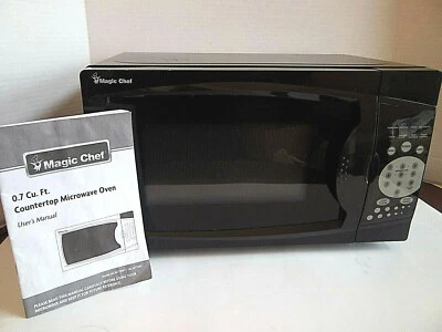 Magic Chef 0.7 Cu Ft 700 Watt Countertop Microwave MCM770B1 Black w/Users Manual - Image 1 of 4