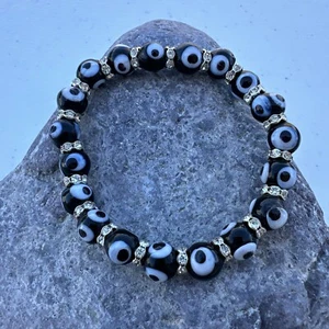 PULSERA DE OJOS MALOS 10 mm Cuentas de Vidrio Negro Elástico Buena Suerte Protección Lámpara - Imagen 1 de 5