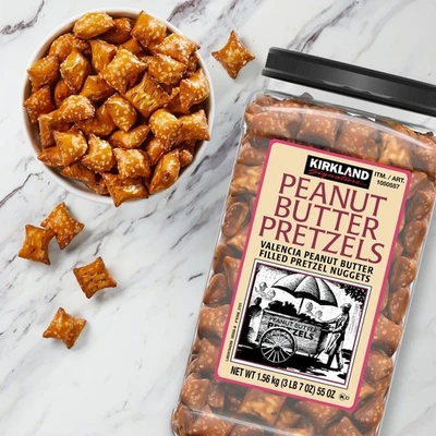 NUEVO Pepitas Pretzel Rellenas de Mantequilla de Maní Kirkland - 55oz/Frasco Snacks Salados Foto 1 de 4