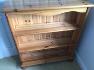 solid pine bookcase, three shelves, bun feet, used, in good condition