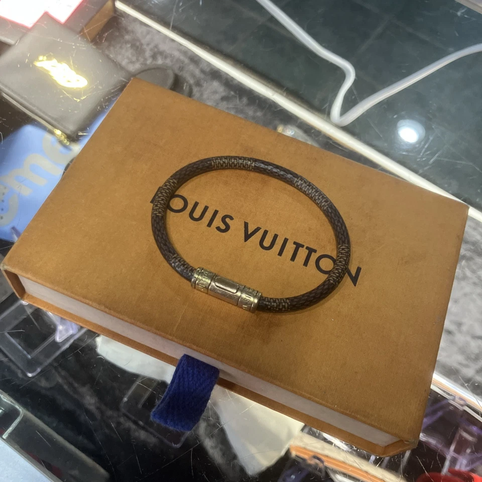 Auténtico brazalete de cuero con monograma Louis Vuitton LV Keep It marrón dorado 126038 Foto 1 de 2