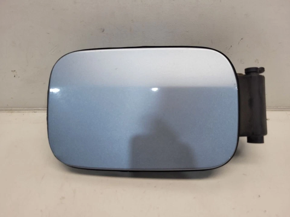 BMW X3 2005 (3,0 L/AT) puerta de llenado de combustible *azul/896* virutas de pintura Foto 1 de 4