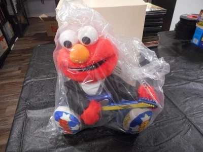 Guitarra Elmo Rock N Roll 1997 exclusiva de Avon toca música canta y agita nueva en caja (C) Foto 1 de 4