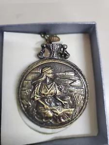 Strada Victorian Style Brass Tone Pocket Watch Necklace Woman in Field - Picture 1 of 2
