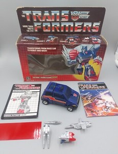 TRANSFORMERS G1 SKIDS 1985 with BOX, Weapons, Instruction Booklet.