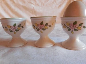 3 Porcelain Egg Cups with Delicate Floral Design (unmarked) plus 1 Ceramic Egg - Picture 1 of 5