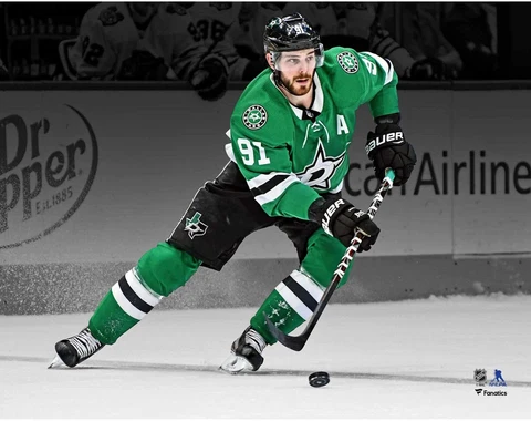 Tyler Seguin Dallas Stars Unsigned Green Jersey Skating Spotlight Photograph Cover