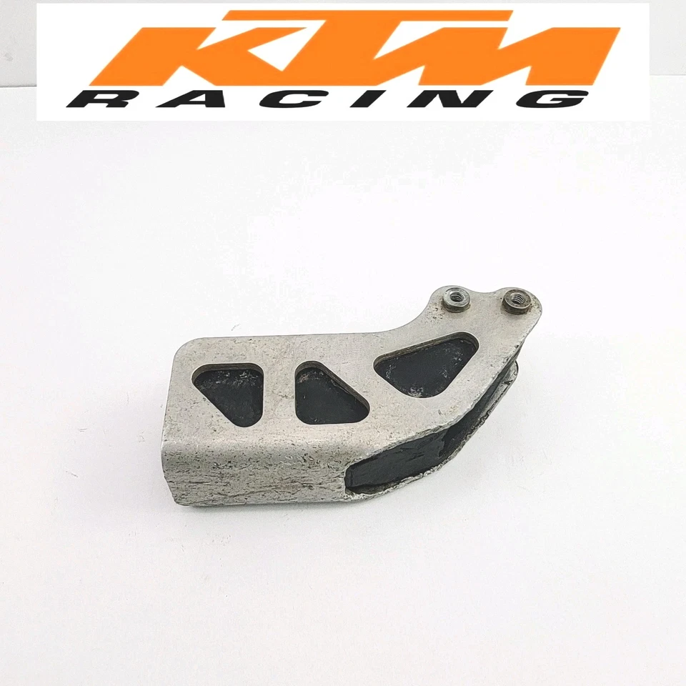 2004 04-07 KTM 85SX 105 125 200 250 300 350 450 SX EXC Protector de guía de cadena deslizante  Foto 1 de 4