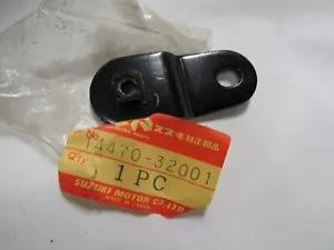 NOS Suzuki OEM BRACKET MUFFLER HANGAR 71-77 TM400 TS400 14470-32000 - Bild 1 von 2