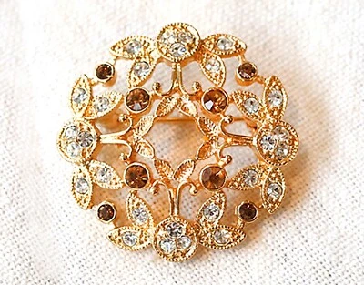 WOMEN'S GOLD TONE BROOCH WITH 8 BRONZE CRYSTALS AND 28 RHINESTONES Foto 1 de 4