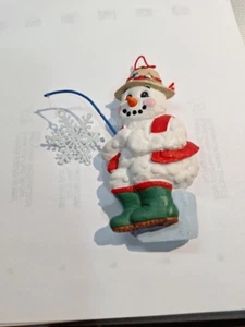 Seated Snowman Fishing with a Snowflake Ornament made of Resin @3.75" X 3" DV121 - Picture 1 of 6