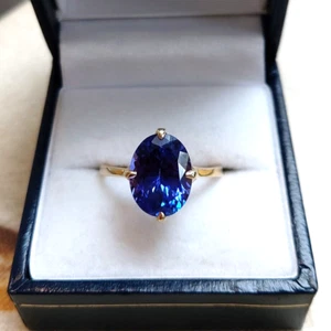 4.5 ct AAAA VVS Tanzanite Solitaire set in 14k Yellow Gold CUSTOM MADE CERTIFIED - Picture 1 of 3