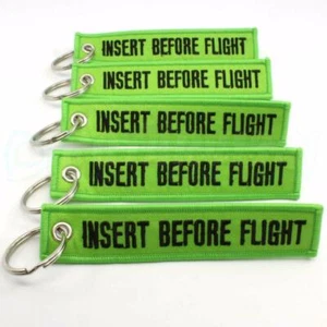 INSERT BEFORE FLIGHT QTY= 5 PCS LIME GREEN/black KEYCHAIN RING TAGS CABIN CREW - Picture 1 of 3