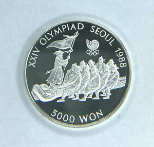 1986 5000 Won South Korea Seoul 1988 Olympic Games Tug Silver Proof Coin - Picture 1 of 2