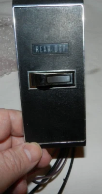 Buick Wildcat Electra 225 LeSabre 1969-70 interruptor de desagüe de descongelación trasero y bisel Foto 1 de 4