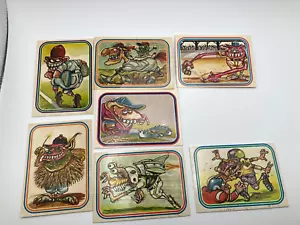 7 Vintage Donruss Super Freaks Baseball & Football Sticker Cards - Picture 1 of 4