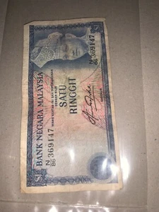 Malaysia RM1 taha N86 369147 ( bottom right corner tear off)  - Picture 1 of 2