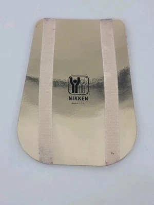 Промо-подушечка Nikken Kenko СЕРЕБРИСТАЯ гибкая сзади  - Изображение 1 из 3