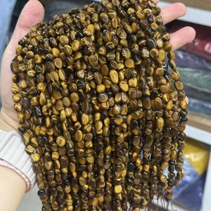 Pepita di ciottoli liscia irregolare naturale originale 6x8 mm gemme occhio di tigre giallo perline - Foto 1 di 4