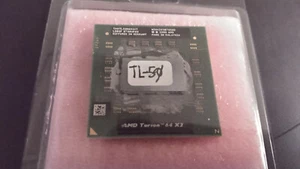{AMD} Turion 64 X2 {Taylor} TL-50 1.6 GHz Socket S1g1 CPU {TMDTL50HAX4CT} - Picture 1 of 3