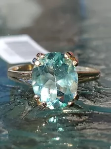 Anillo solitario de corte ovalado de fluorita creado en laboratorio de oro amarillo macizo de 10 quilates - Imagen 1 de 12