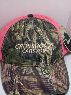 B - Mossy Oak Hot Pink And Camo Colored Snapback Button Crossroads Cars.Com... - Image 1 of 3