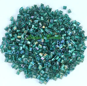 11/0 Triangle Toho Japan Glass Seed Beads #270-Crystal/Prairie Green 10 grams - Picture 1 of 2