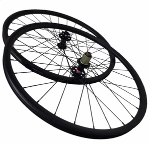 Set ruote 26er XC mountain bike clincher tubeless sgancio rapido mozzo asse passante - Foto 1 di 11