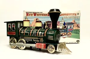 VINTAGE A BATTERIA MYSTERY ACTION NUOVO WESTERN SPECIAL LOCOMOTIVA TRENO DI LATTA - Foto 1 di 11