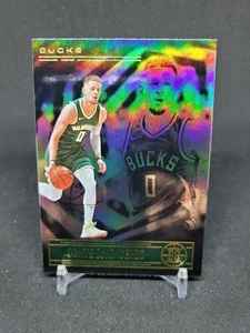 Donte DiVincenzo 2020-21 Panini Illusions Basketball No. 87 - Picture 1 of 2