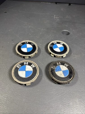 BMW X3 2006 juego de 4 tapacubos OEM pieza usada envío gratuito Foto 1 de 4