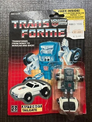 Vintage G1 Hasbro Transformers Minibot Tailgate MOC Bubble Partially Attached - Image 1 of 4
