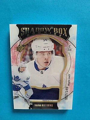 2016-17 Auston Matthews SPX Shadow Box Rookies Jersey Patch RC /149 - Image 1 of 4