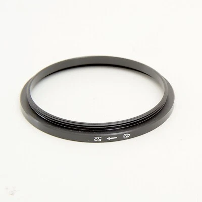UNBRANDED 49mm - 52mm STEP  RING  #AC744 - Image 1 of 2