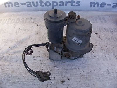 87-92 CADILLAC FLEETWOOD BROUGHAM TRACCIÓN TRASERA OEM SUSPENSIÓN BOMBA COMPRESORA DE CHOQUE DE AIRE Foto 1 de 4