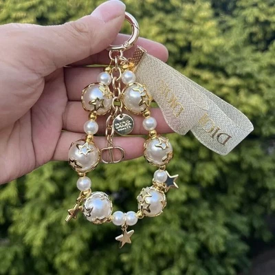 Dior Nuevo Novedad Perlas Estrella Dije Oro Estrella de la Suerte Llavero Regalo Llavero Foto 1 de 4