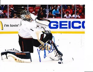 ANAHEIM DUCKS JONAS HILLER SIGNED SHOOTING THE PUCK 8X10 - Picture 1 of 1