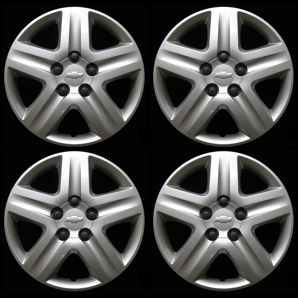 Juego de tapacubos Chevrolet Impala 2006-2011 - Original GM OEM 16 pulgadas 3021 logotipo plateado Foto 1 de 4