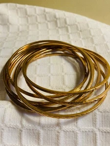 8 VINTAGE INTERTWINED GOLDTONE METAL NARROW BANGLES.COOL,TIMELESS - Picture 1 of 7