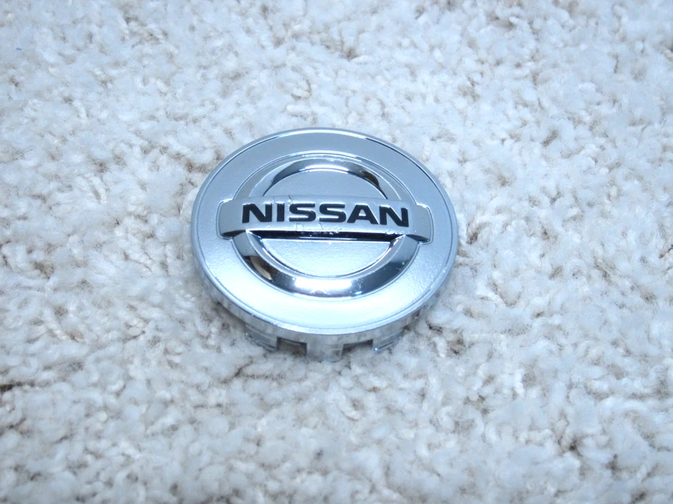 Tapa central de llantas de aleación Nissan Cube, Juke, Leaf, NV200 OEM 40343-2DR0A #2E-11 Foto 1 de 2